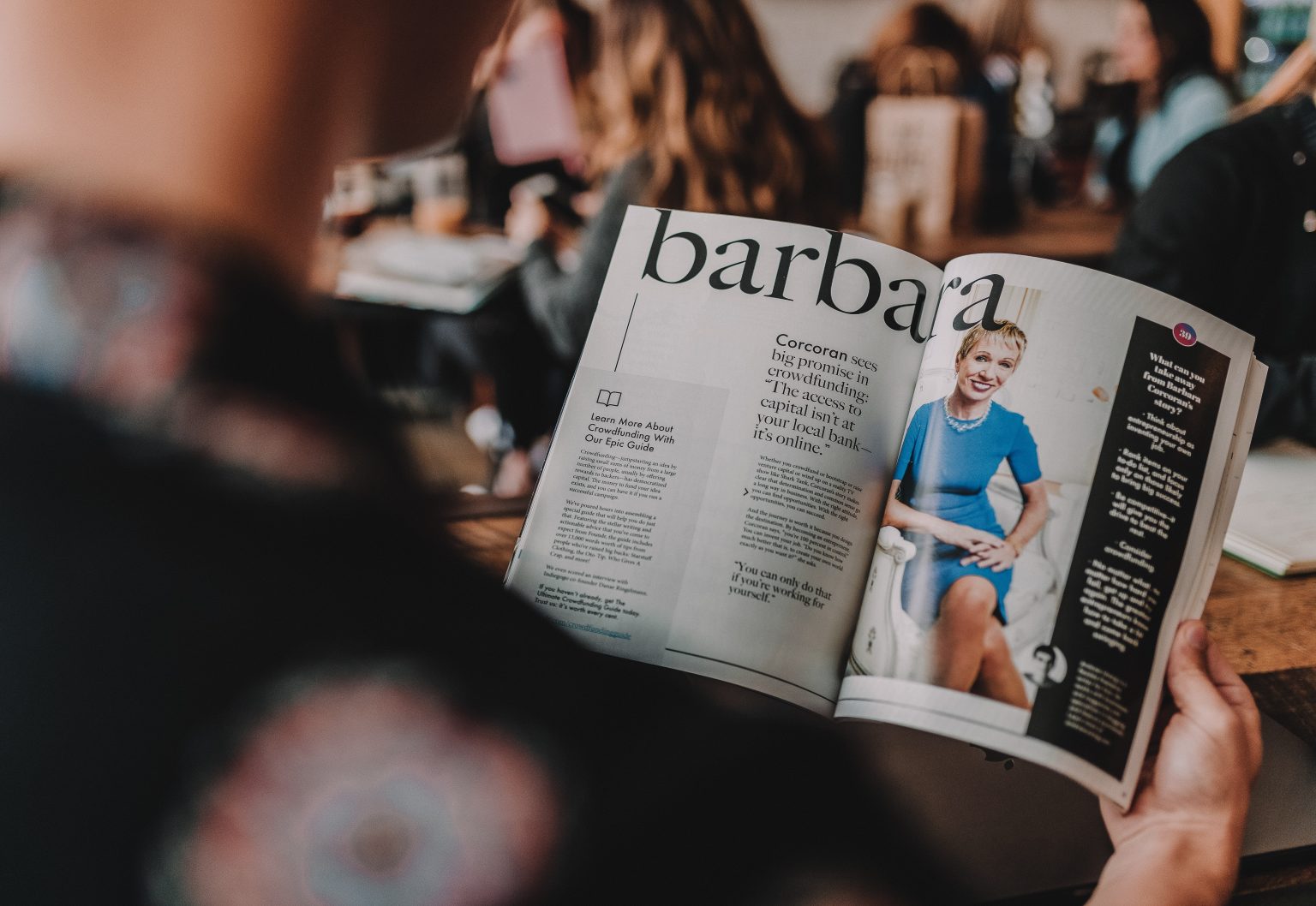 person reading magazine