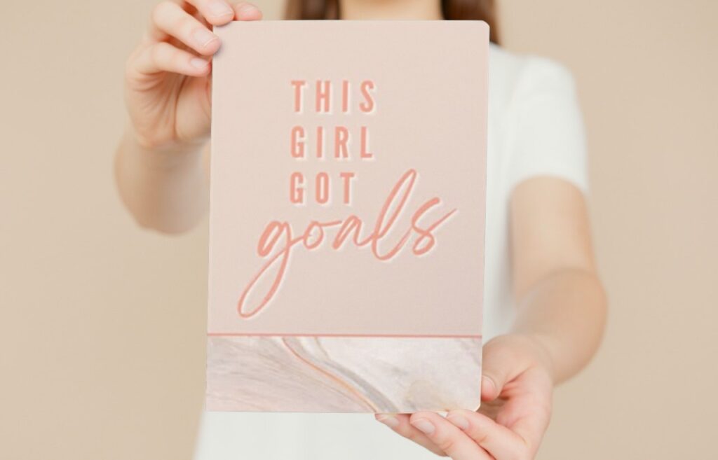 Girl holding Productivity Planner